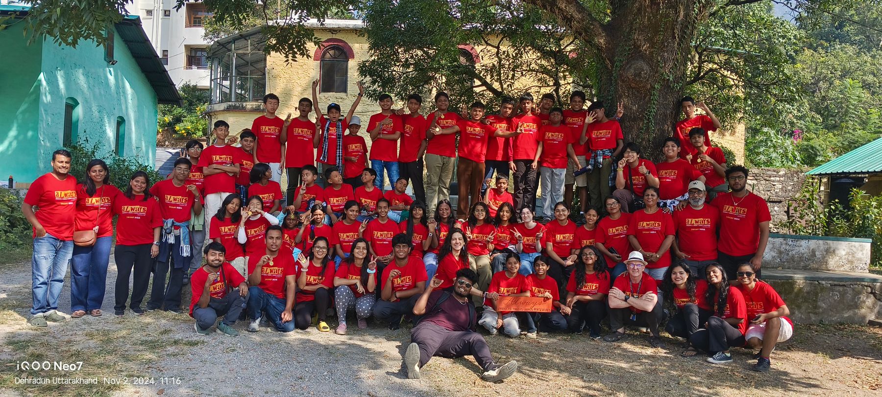 The first Delhi camp in red shirts under the trees